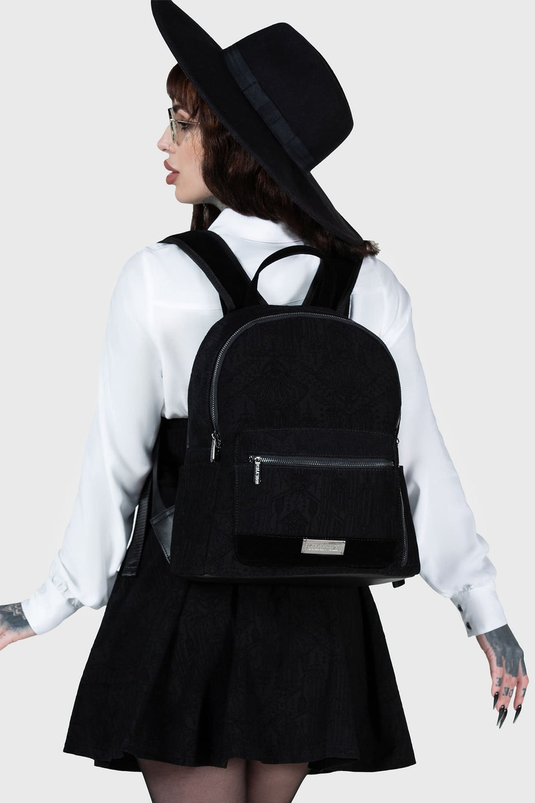 women wearing a gothic backpack