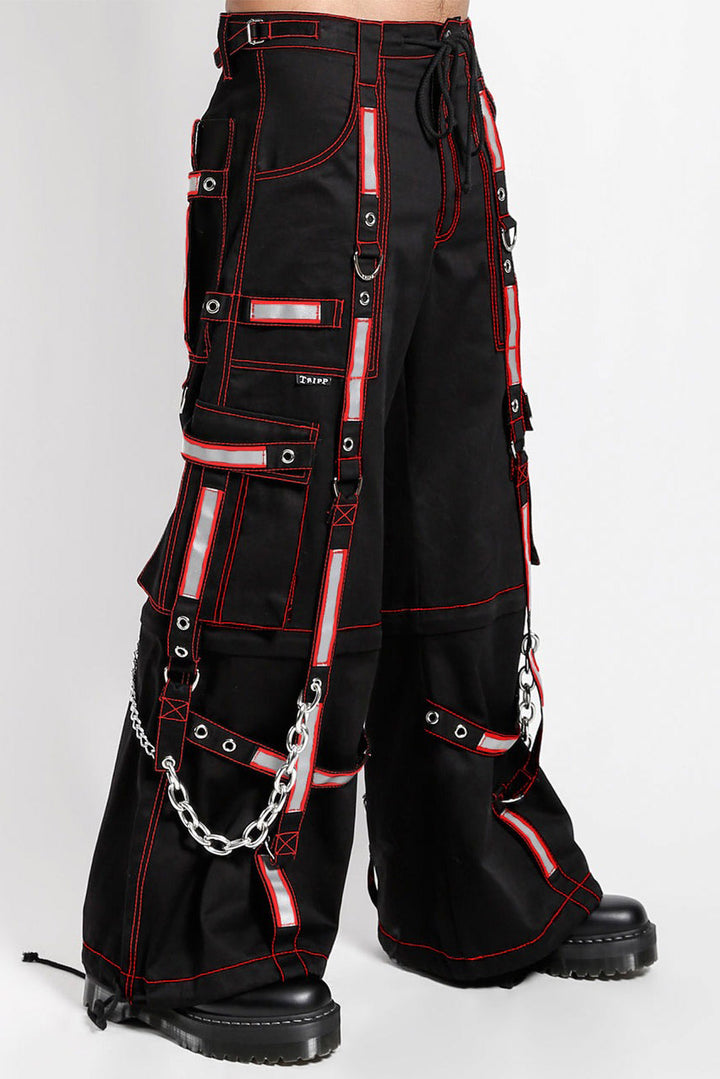 Black pants with red accents and chains on a white background