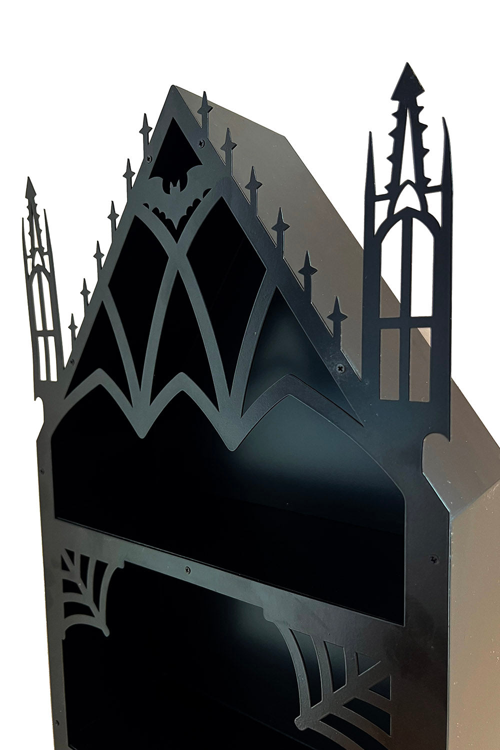 black spiderweb and bat shelf