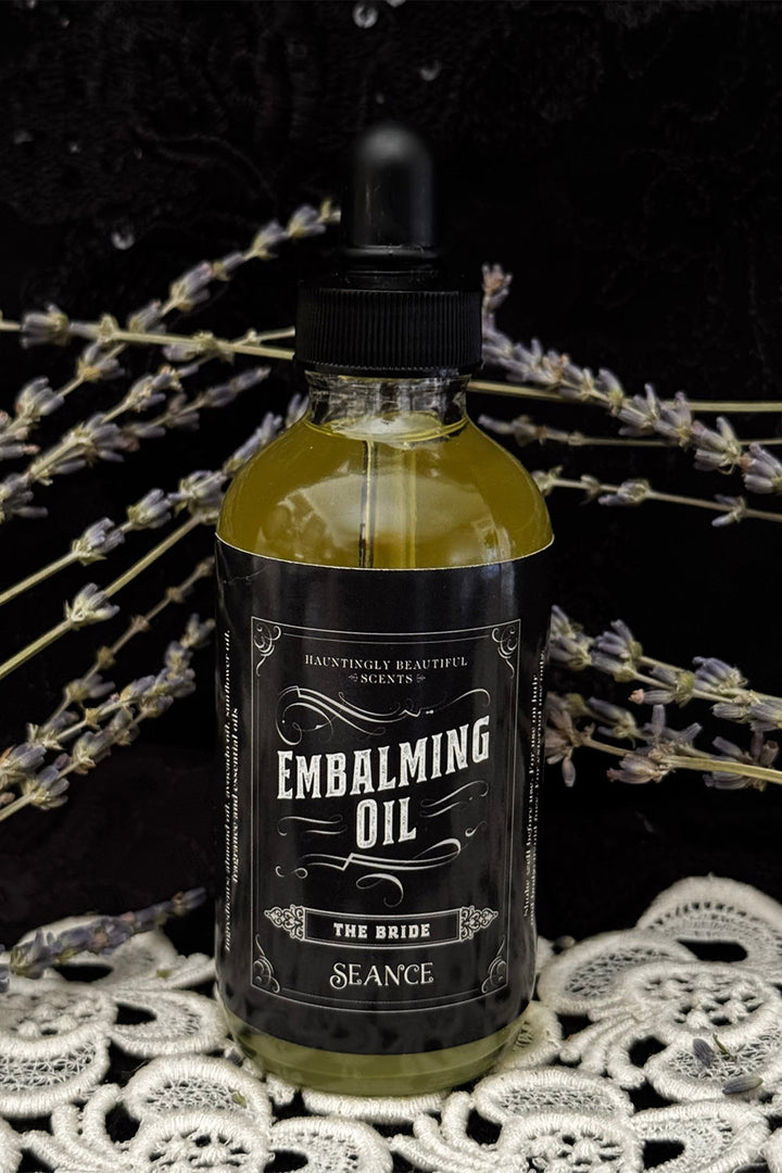 natural witchy hair oil in a glass bottle