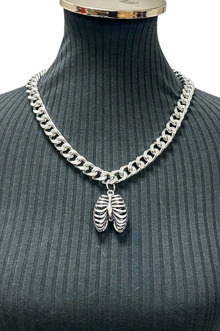 silver cuban chain necklace with ribcage pendant 