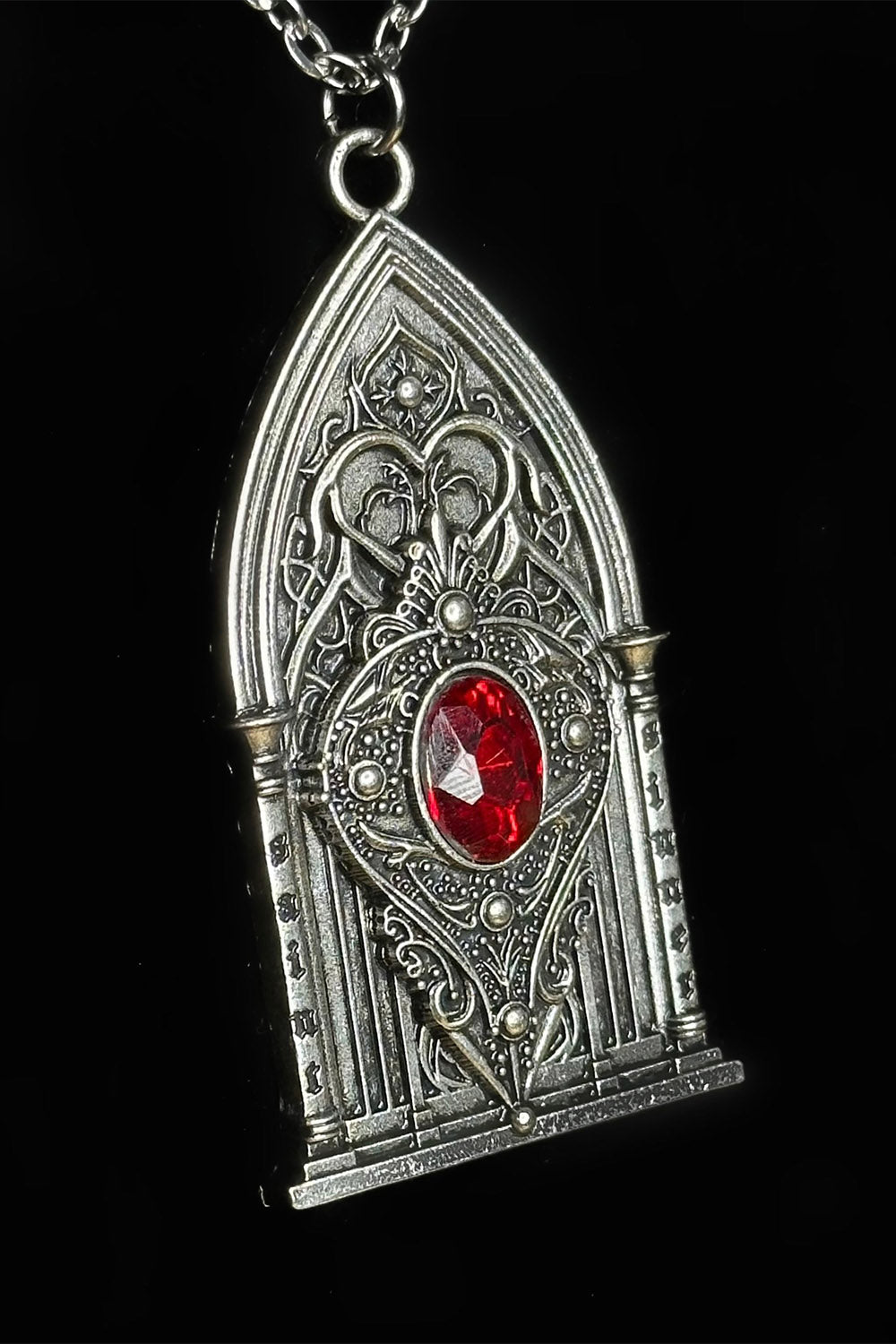 ornate medieval goth cathedral stained glass window necklace
