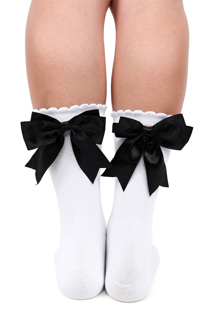 white scalloped socks with black bows