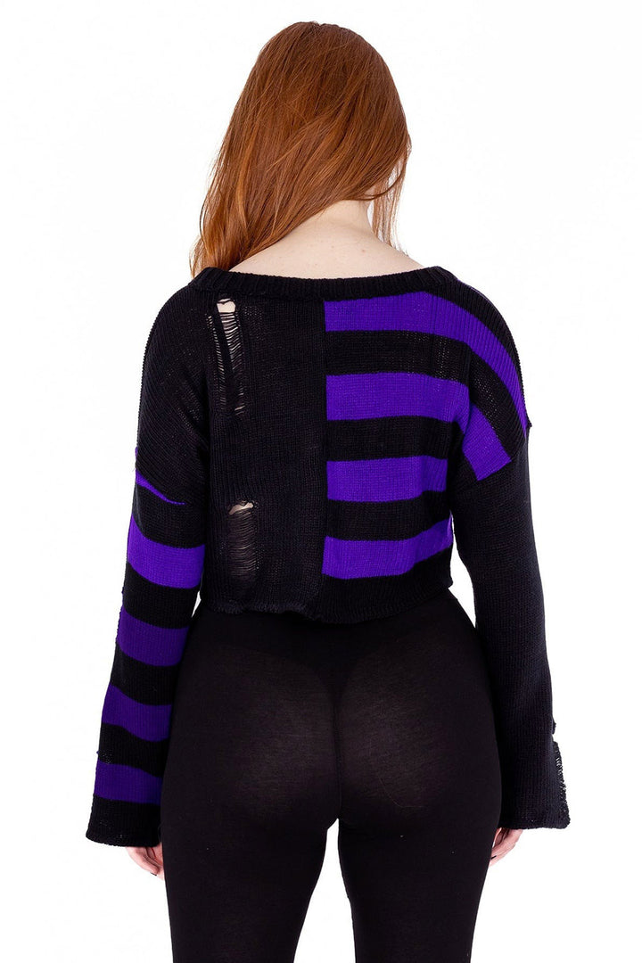 distressed sweater with flared sleeves