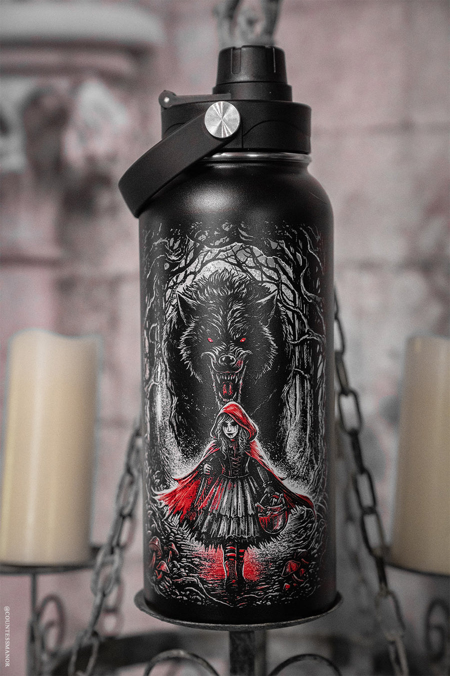horror Black water bottle with a wolf and little red riding hood graphic on the front and back