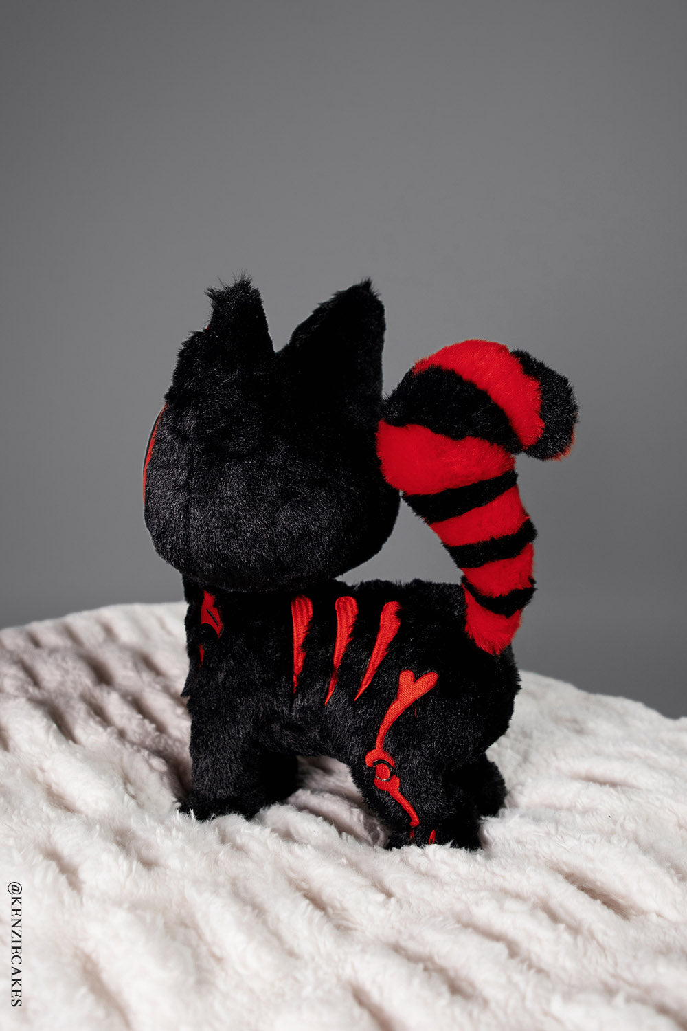 red and black Skelekitty plush toy by vampire freaks