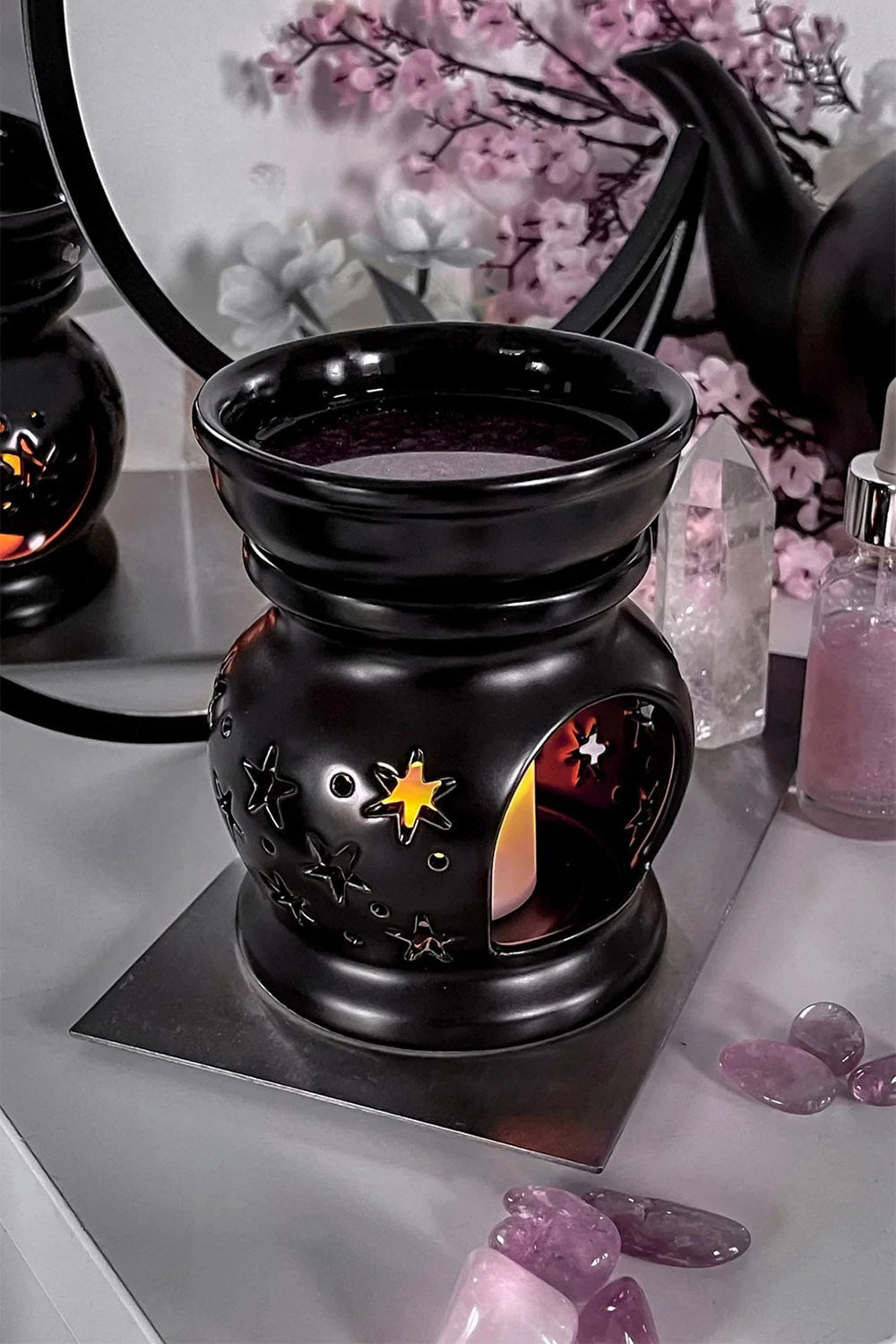 black gothic tea light candle holder with crescent moon cutout