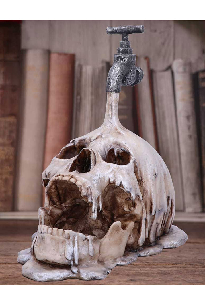 haunting human skull statue