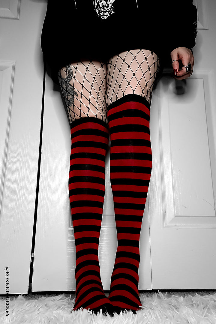 red and black striped socks with attached garter belts