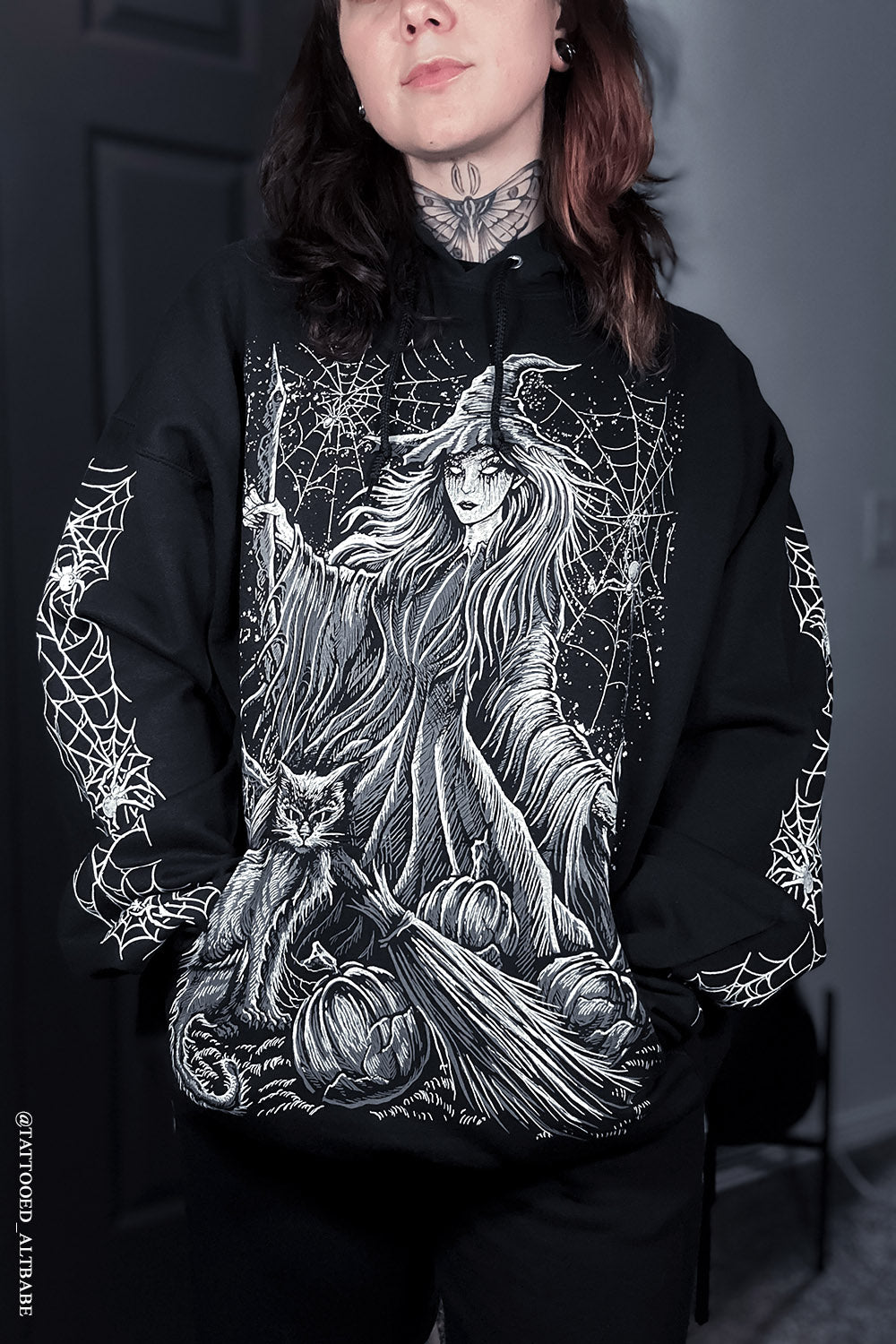 spiderweb sleeve pullover hoodie with witch graphic print