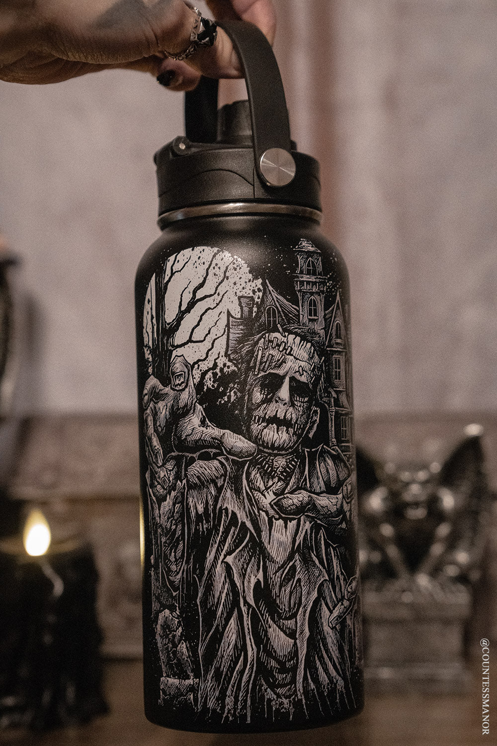 Frankenstein water bottle with top handle lid