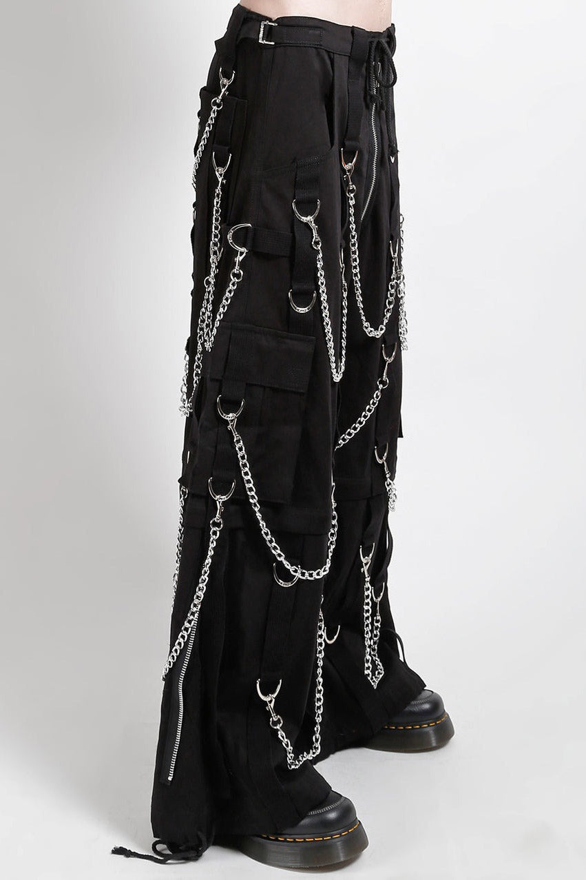 Black pants with chain details on a white background