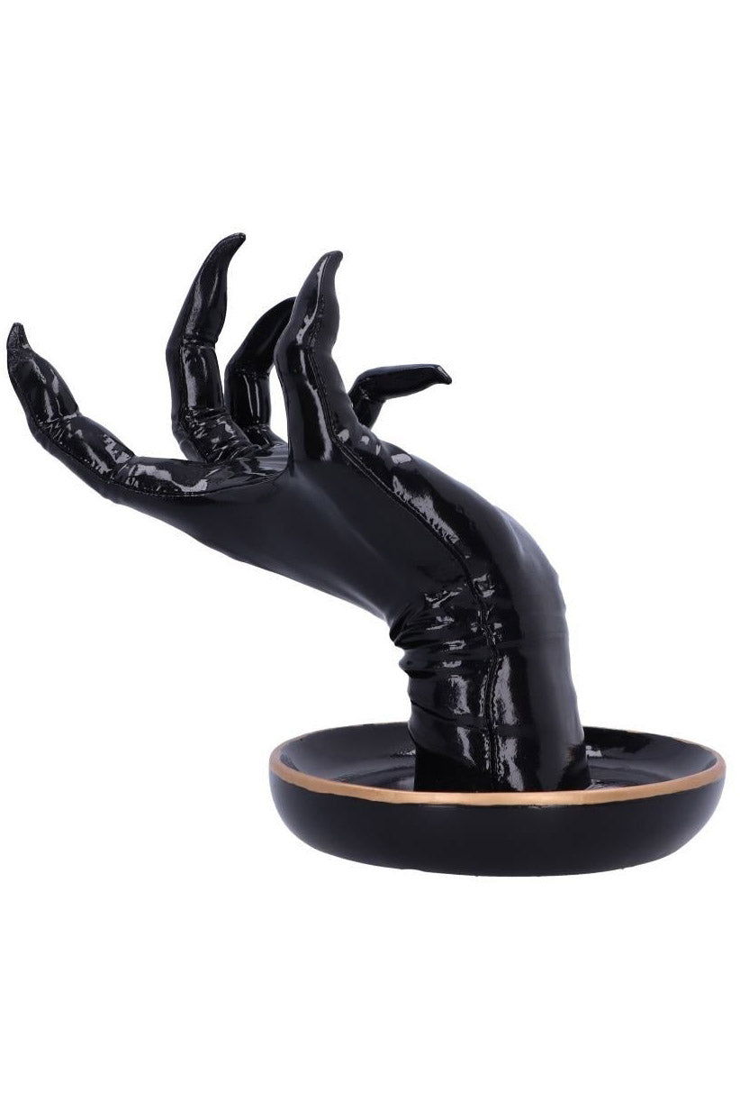 hand that holds rings and jewelry pieces