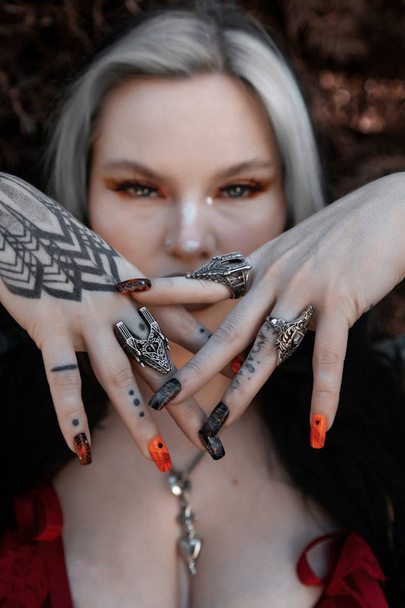 ornate gothic middle finger rings