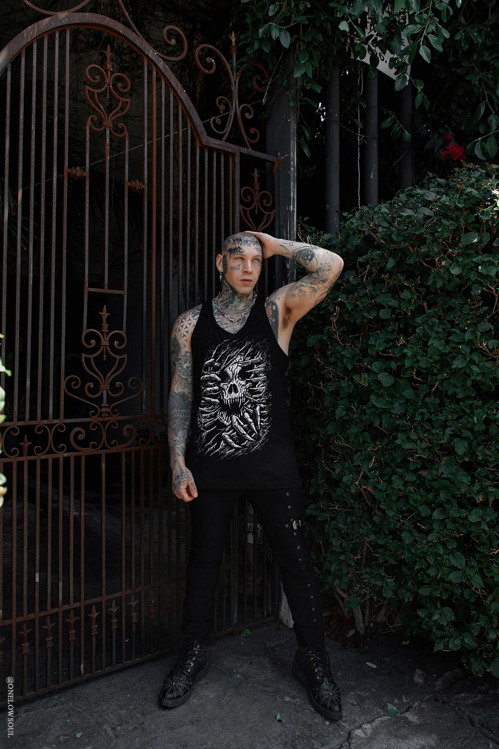 skull bursting through chest graphic shirt