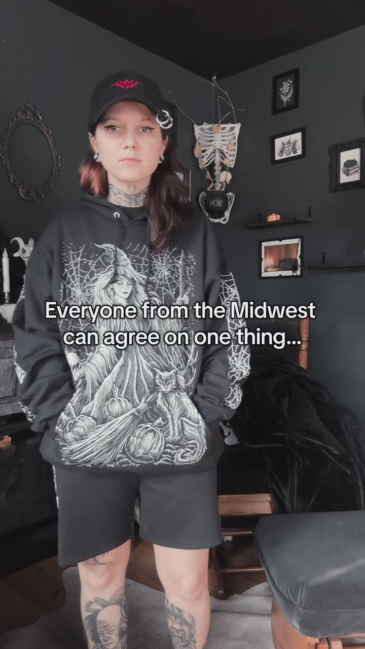 alternative girl wearing goth jogger shorts