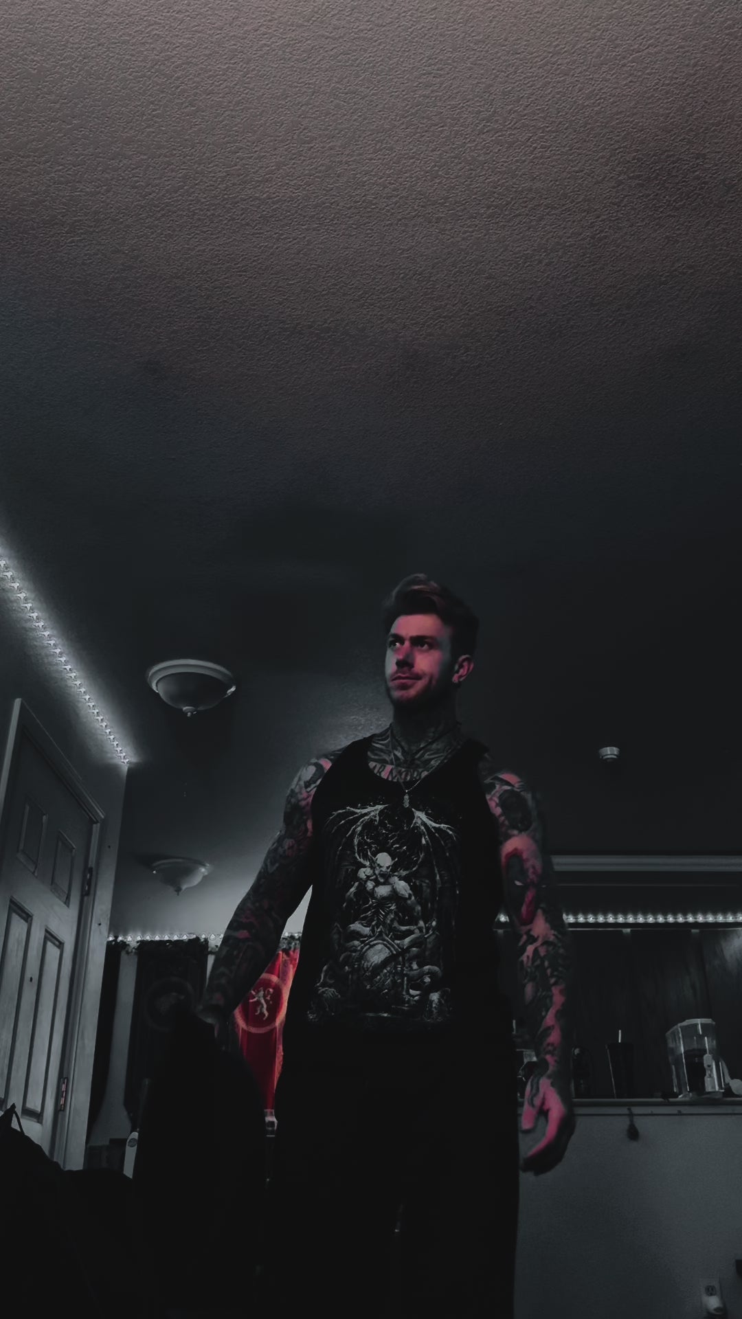 video of tatted guy wearing tattoo clothing