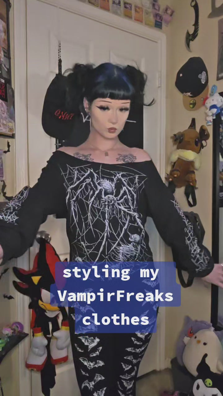 video of goth girl wearing vampire bat leggings