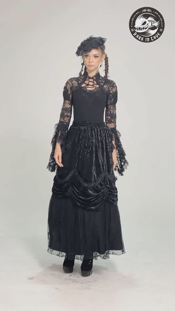 woman wearing a beautiful black cropped shrug