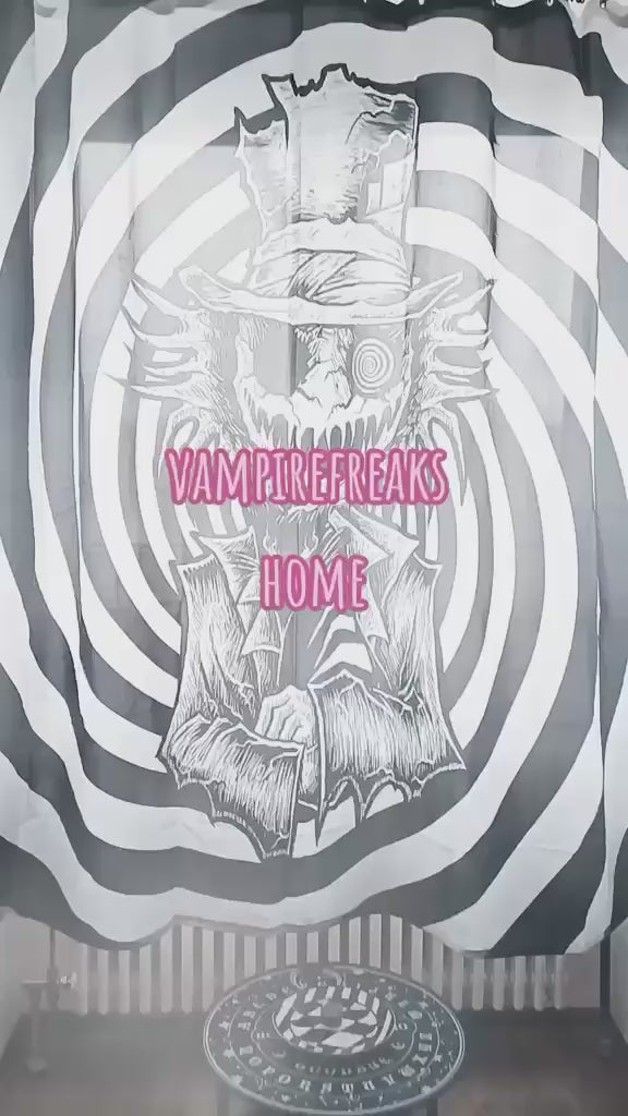 video of gothic girl using a gothic dark alice in wonderland water bottle