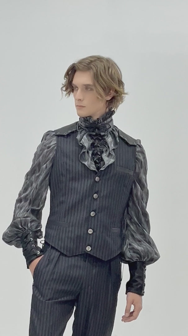 video of a gothic man wearing striped trousers