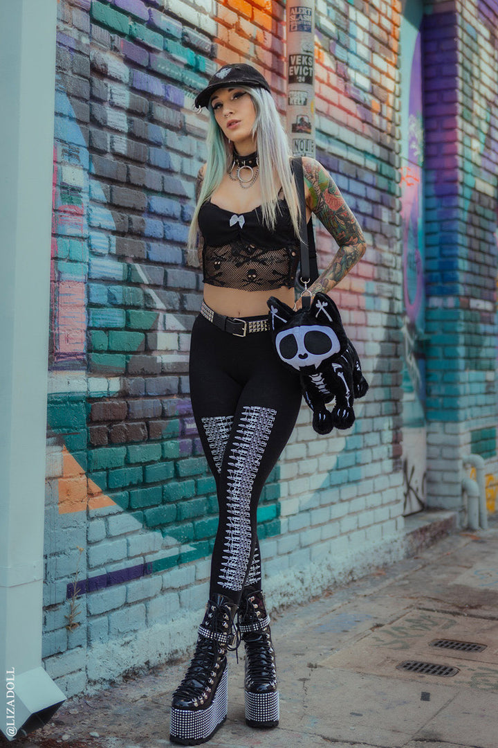 Leggings góticos occidentales con diseño de bala