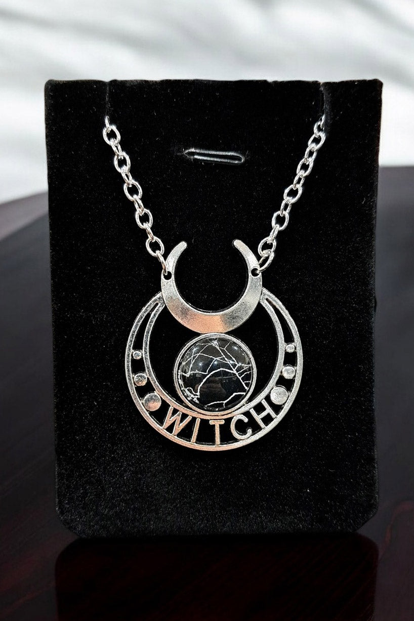 occult witch necklace made with a real spiderweb