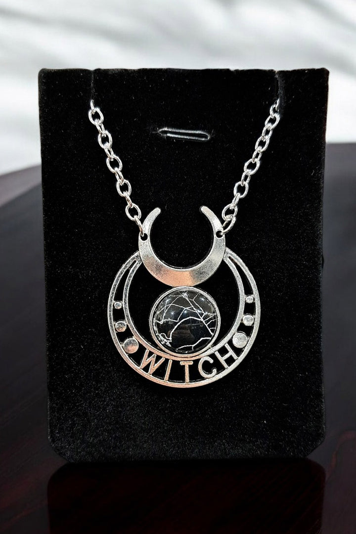 occult witch necklace made with a real spiderweb