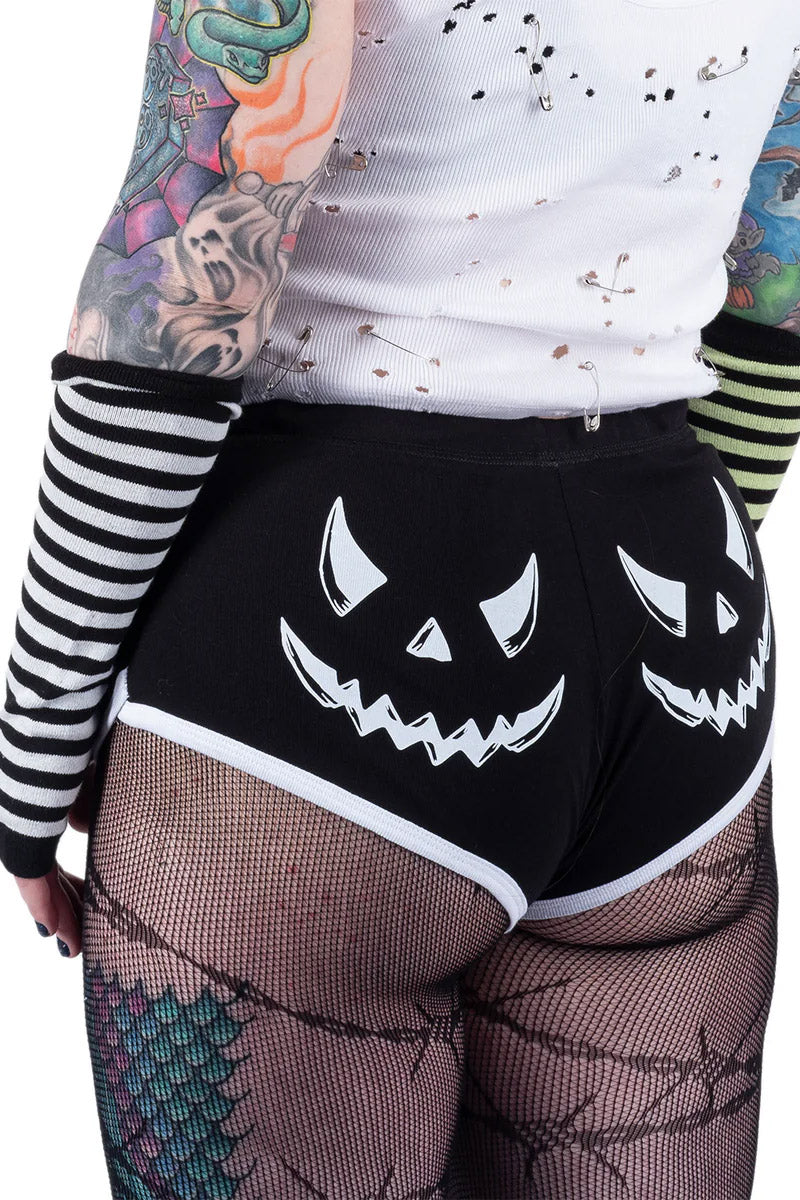 womens pumpkin face shorts