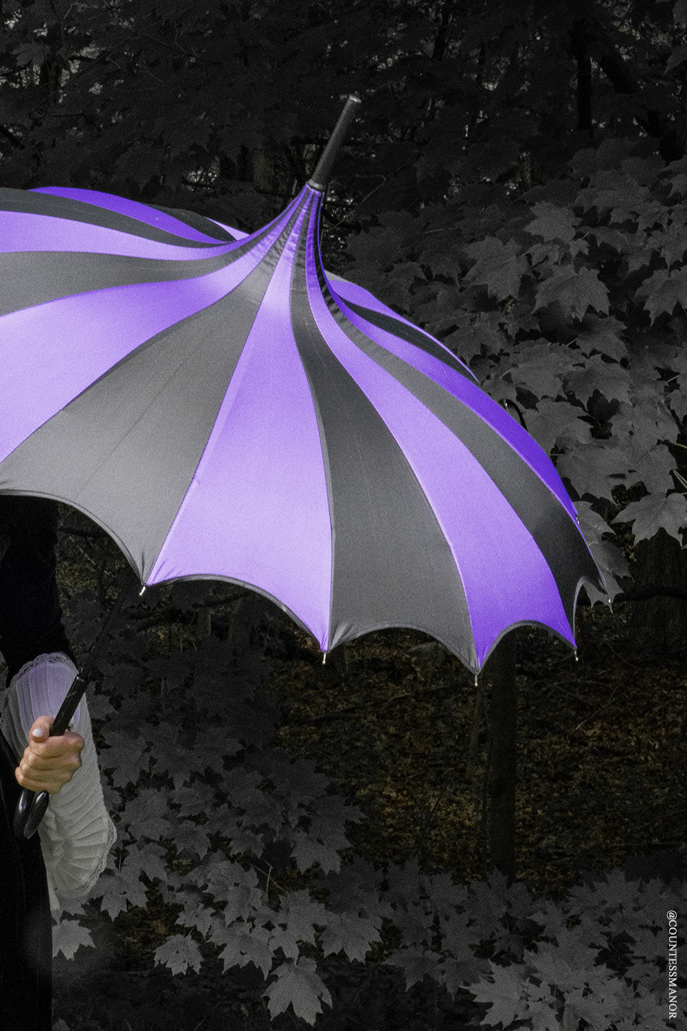 black and dark purple striped umbrella with j shape handle