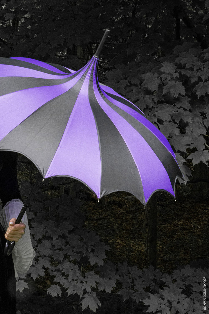black and dark purple striped umbrella with j shape handle