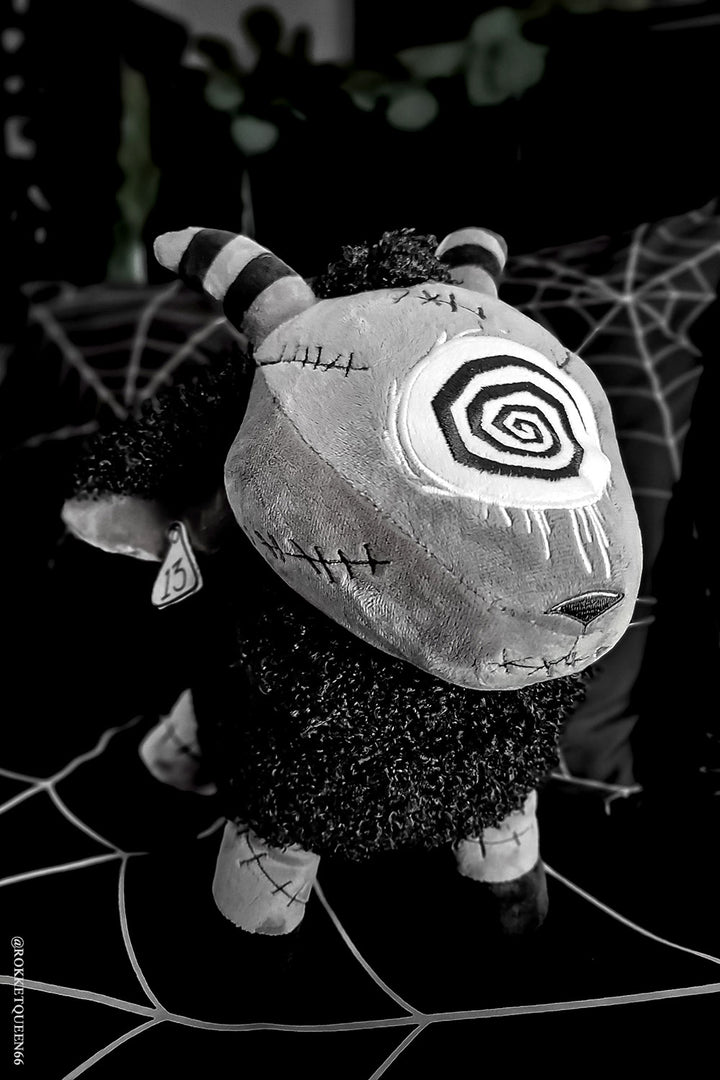 spooky spiral eyeball monster sheep plushie toy