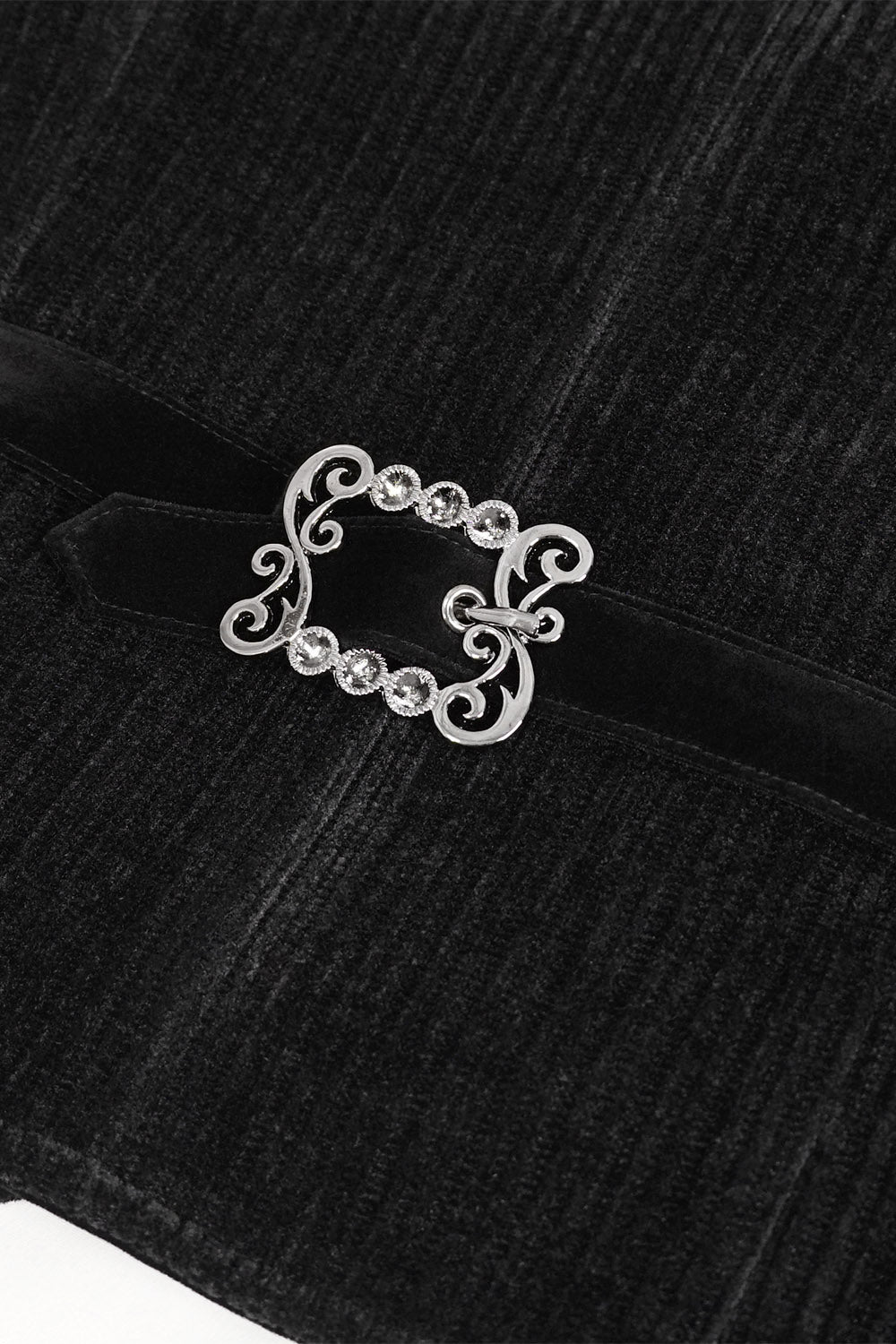 trad goth vest with buckle in the back