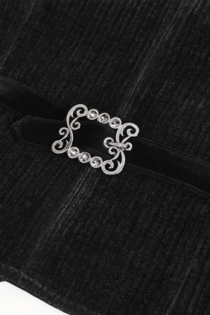 trad goth vest with buckle in the back