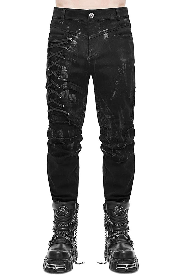 A pair of men's distressed black skinny jeans with lace-up and buckled details, featuring multiple pockets and a zipper fly.