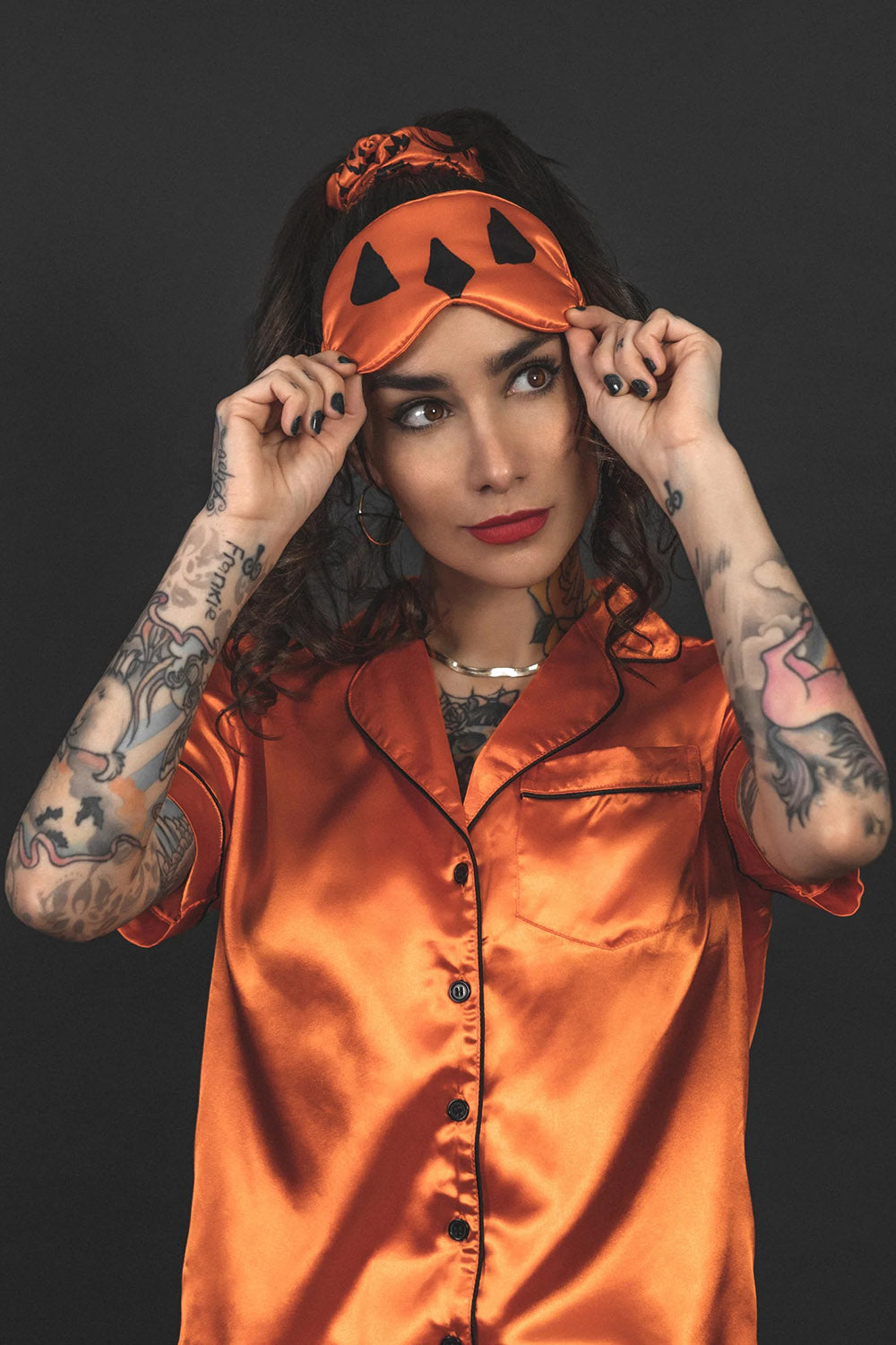 orange and black pumpkin pajama set