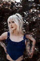 dark blue corset with built-in boning structure, lace embellishment on neckline, satin webbing connection