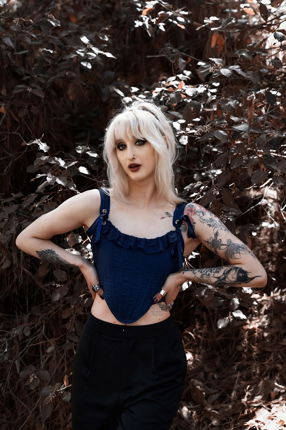 womens blue corset top with lace neckline