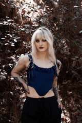 dark blue corset top with lace and ribbon accents
