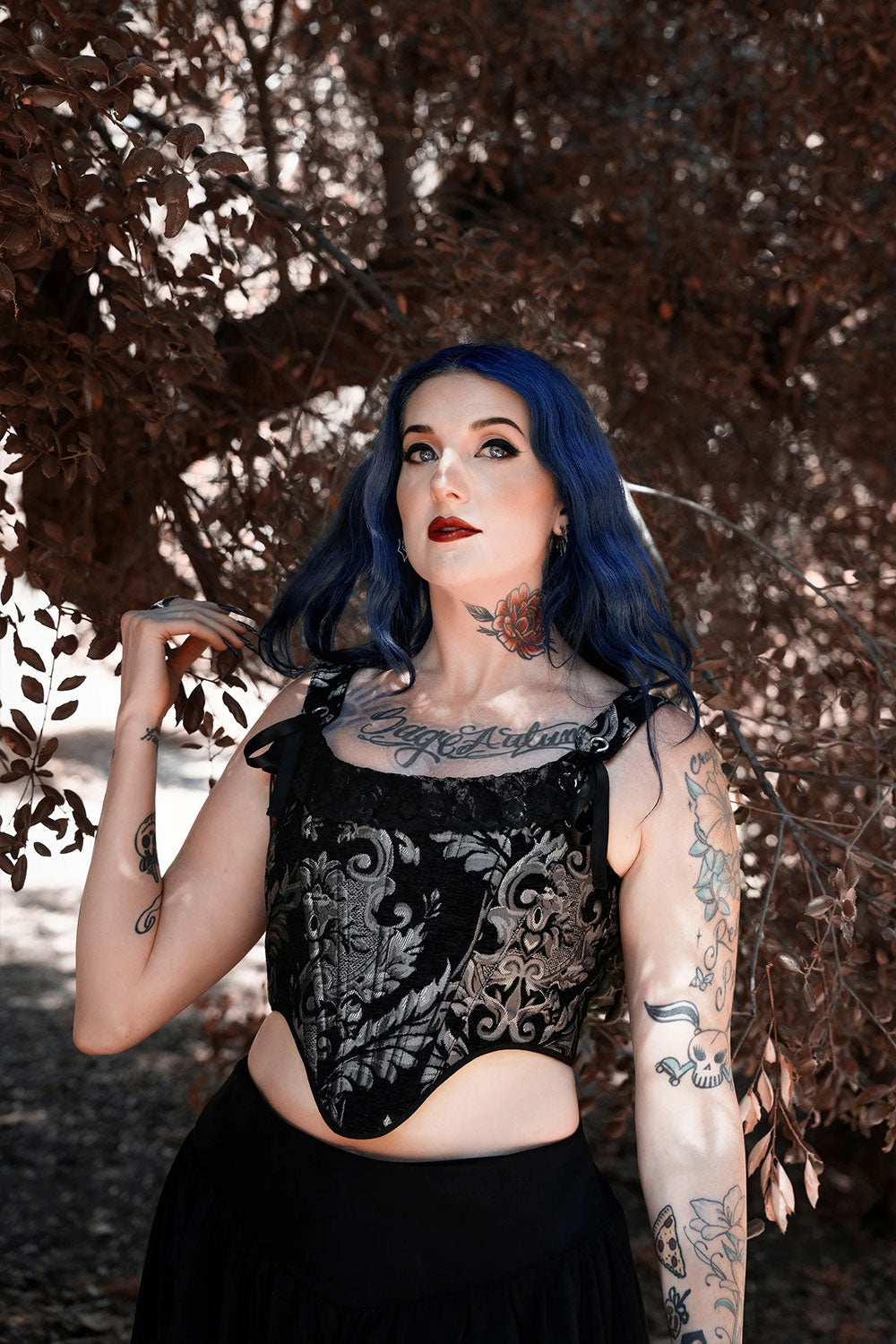 steampunk womens black corset with ribbon straps and lace trim