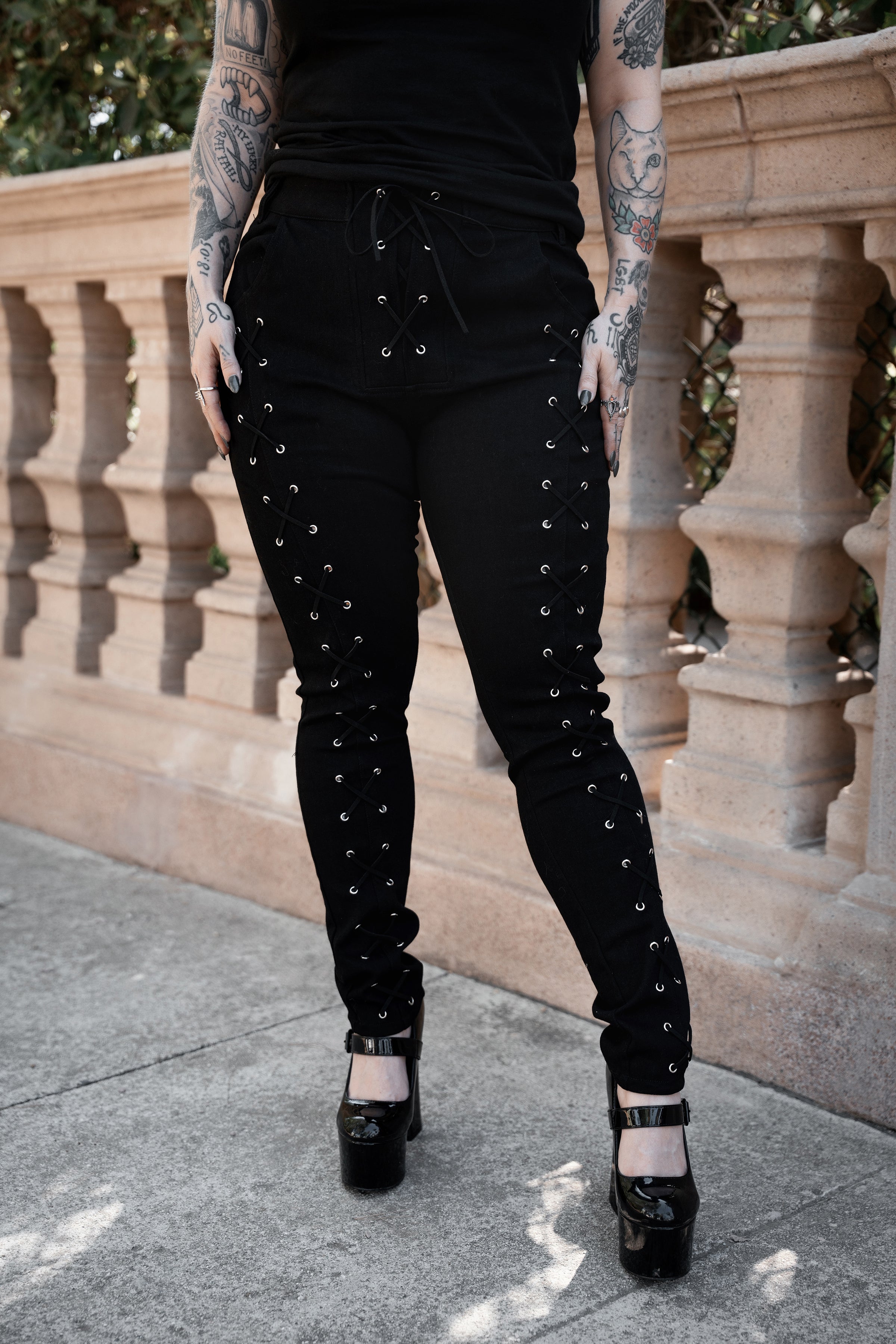 Widow lace up pants by VampireFreaks for gothic streetwear dark romantic fashion and alternative outfit styling
