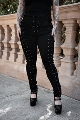 Widow lace up pants by VampireFreaks for gothic streetwear dark romantic fashion and alternative outfit styling