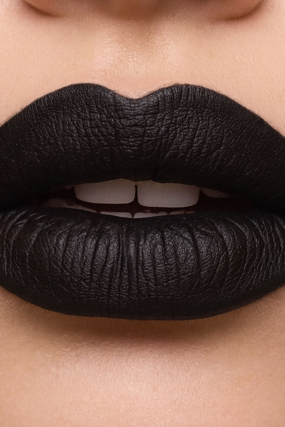 Vegan and cruelty free matte black lip gloss 