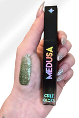 mossy green, high-shine sparkle lip gloss loaded with dazzling, multi-dimensional glitter