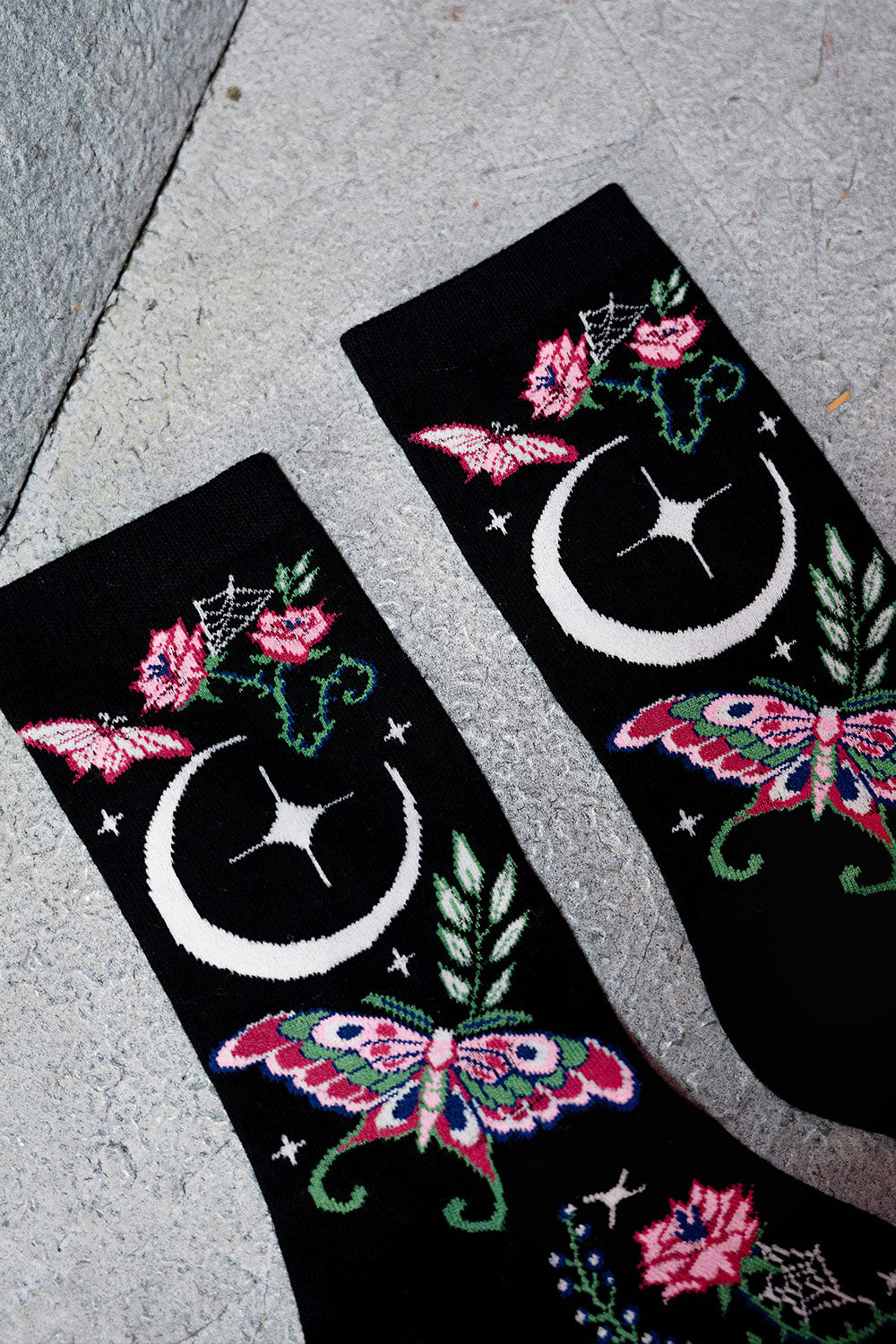 dark fairytale knitted witchy cottagecore moth and moon socks
