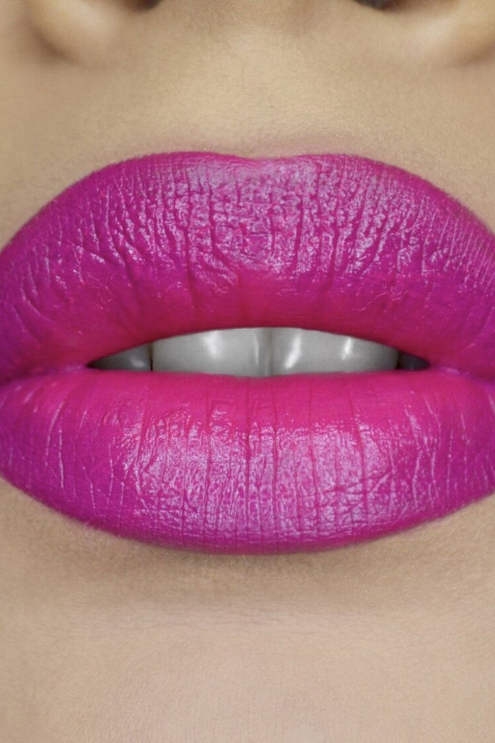 Medusa's Makeup bright pink Triple X colorful lipstick
