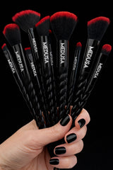 Makeup brushes with ultra-soft synthetic bristles, glossy black ferrules, and signature Gothic Unicorn handles, finished with a luxe, weighted feel