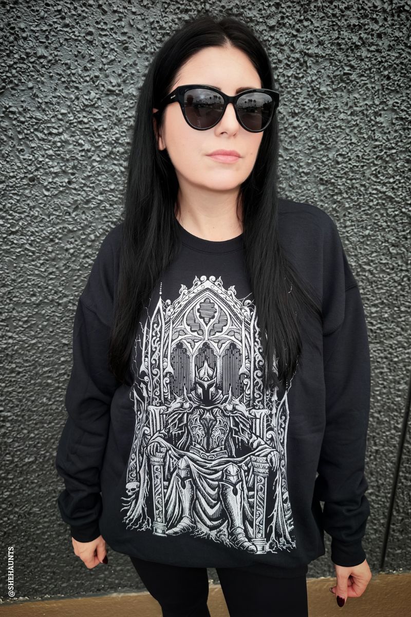 gothic knight sweatshirt worn by a gothic woman