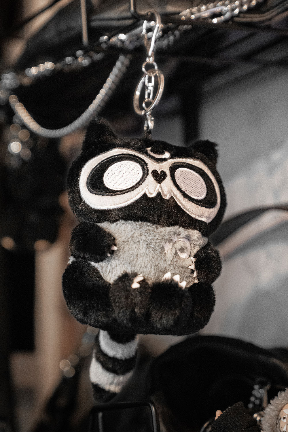 creepy cute stuffed animal raccoon keychain