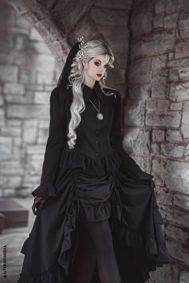 peplum long sleeve puff shoulder blouse with flared cuffs